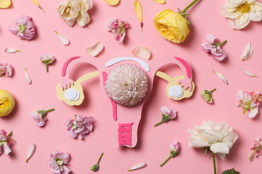 Woman holding flowers shaped like a uterus, symbolizing natural support for women’s hormonal balance and reproductive wellness.